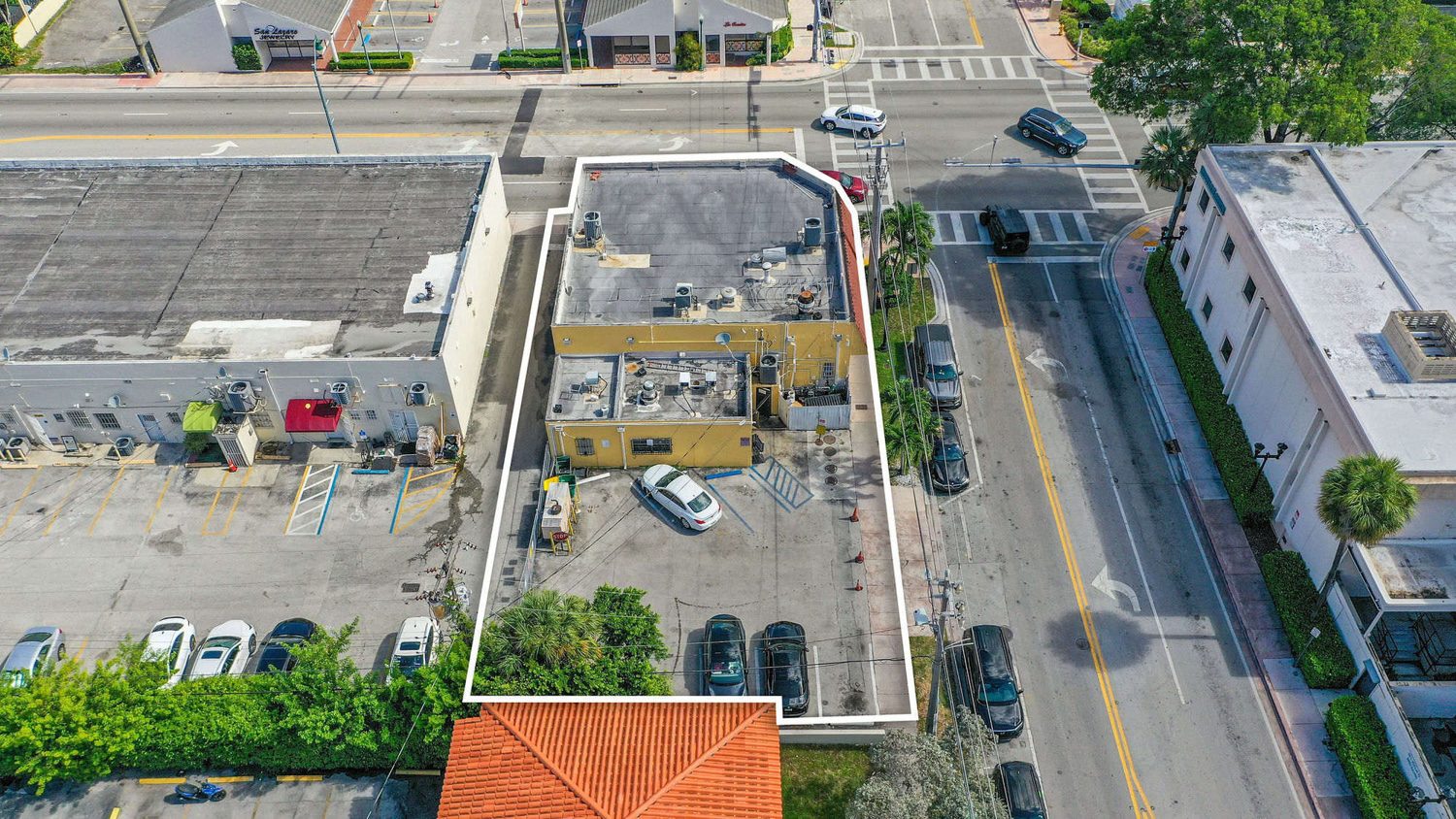 Aerial of the site and rear parking, parcel outlined